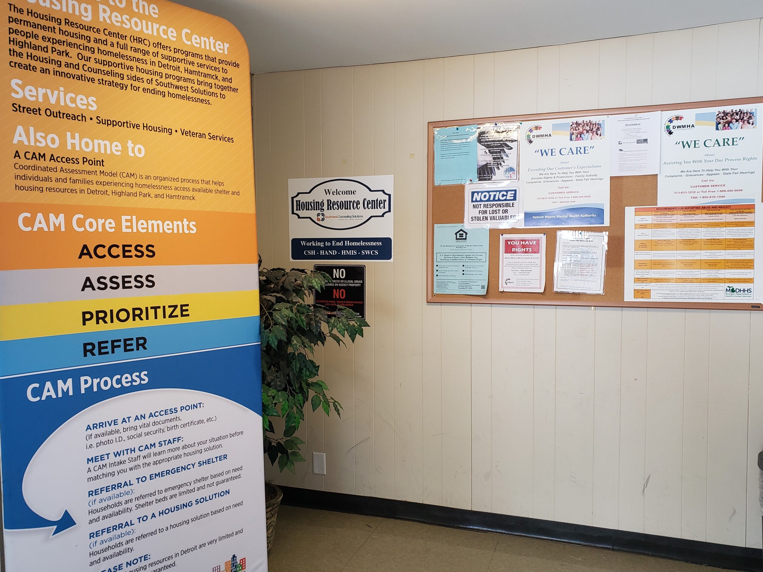 Housing resource center with flyers and a community bulletin board