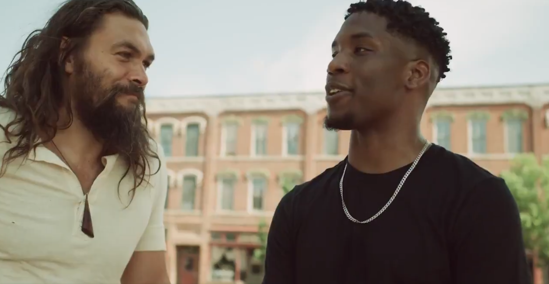 Josh Edmonds having a conversation with Jason Momoa