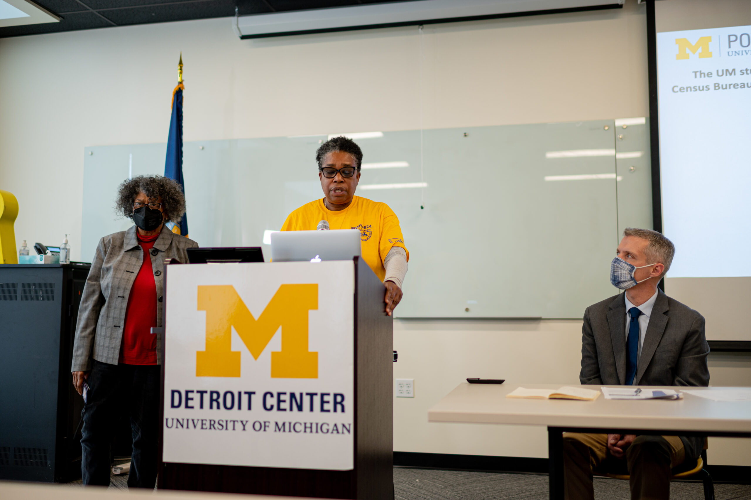 Speaker at a podium during Poverty Solutions census press conference at the University of Michigan Detroit Center