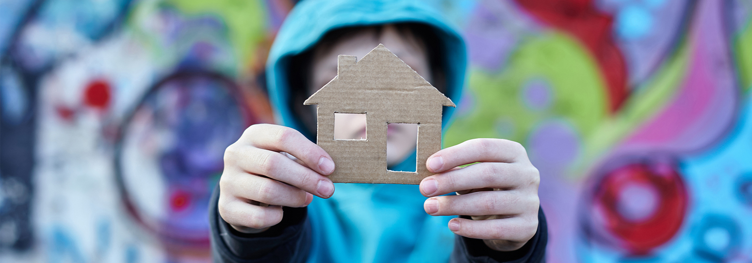 boy with a house cut-out