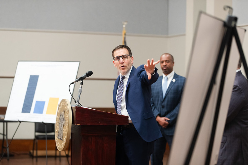 Professor Jeffrey Morenoff speaks at a City of Detroit press conference