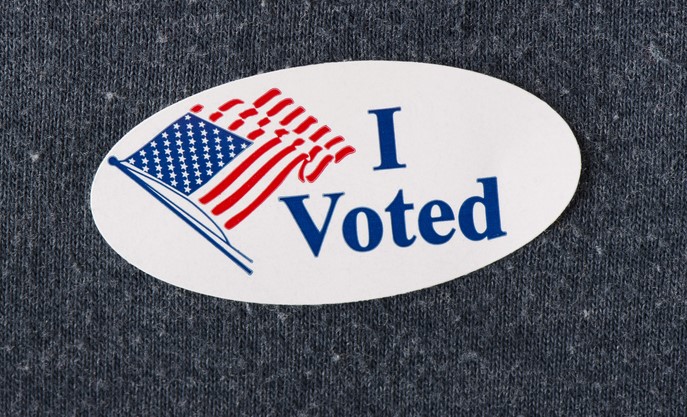 Graphic featuring an “I Voted” sticker.
