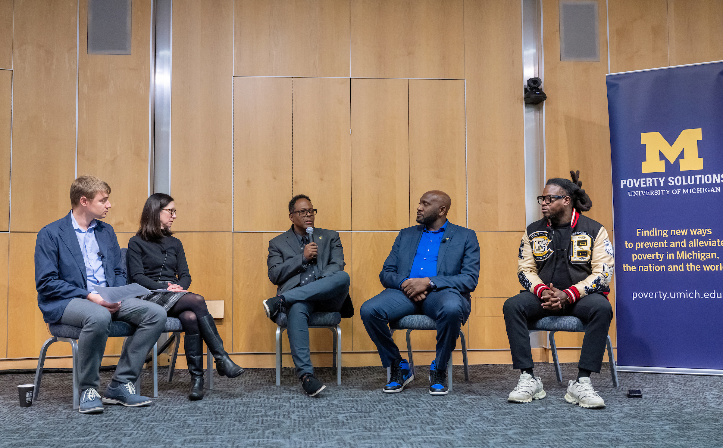 Speakers participate in the Real-World Perspectives on Poverty Solutions series.