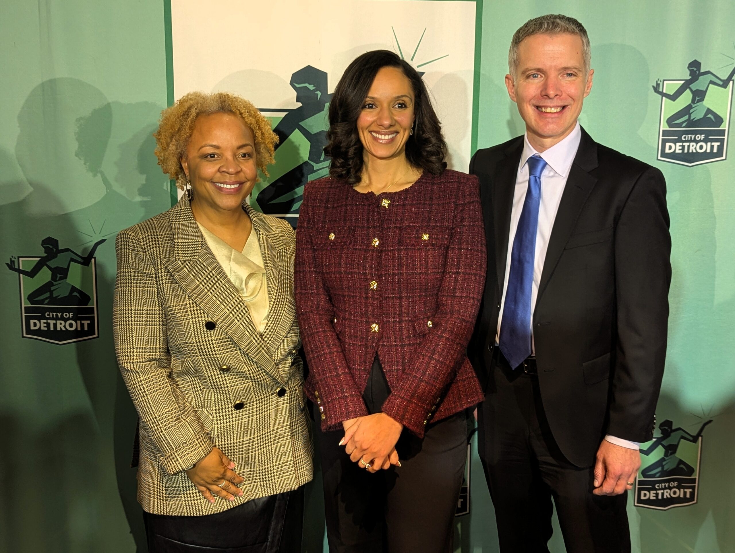Group photo of Benita R. Miller stands with Detroit Mayor Mary Sheffield and Luke Shaefer