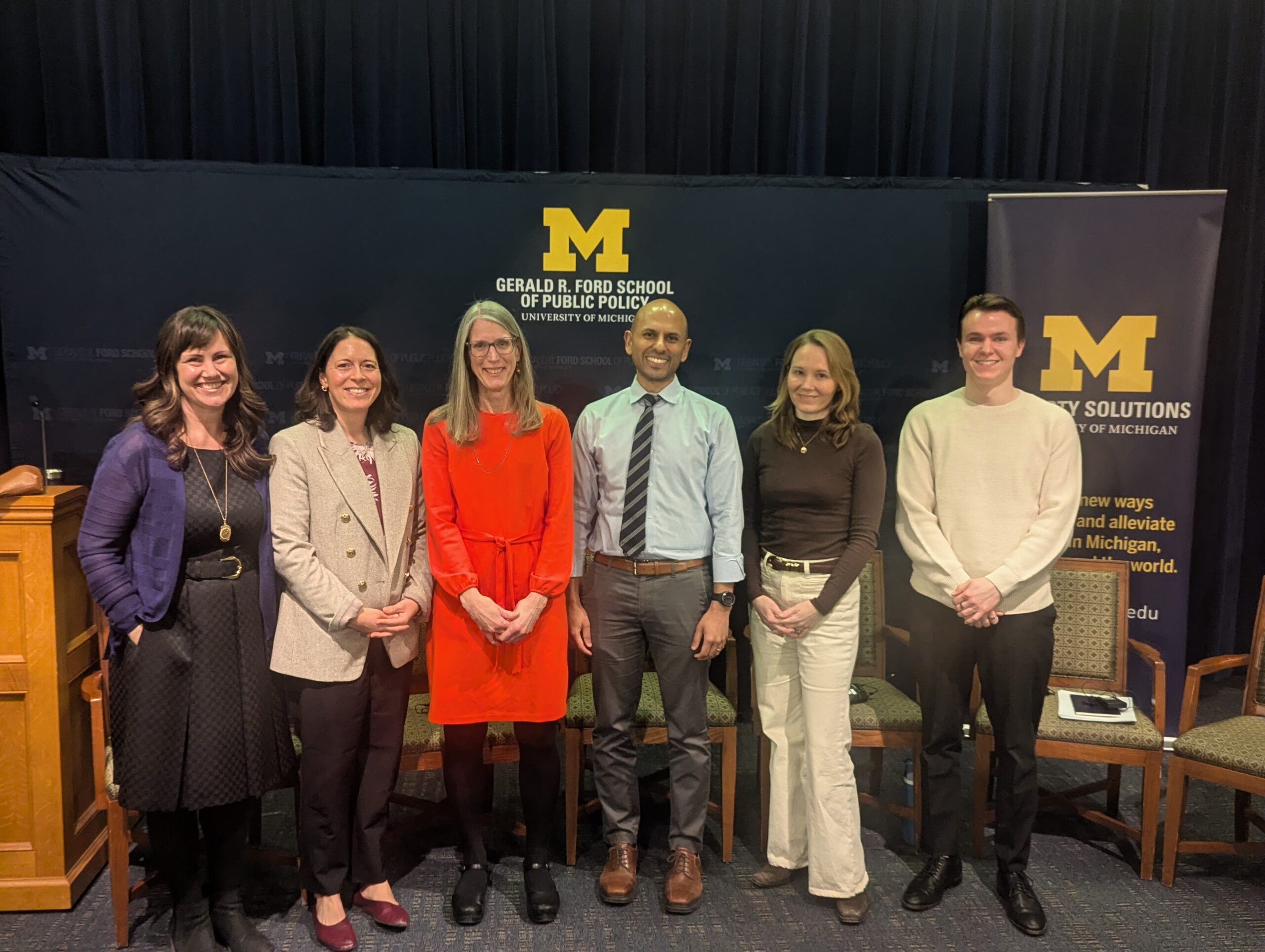 U-M professors on the student moderator for The Debate on Cash Transfers panel held March 25, 2026, at the Ford School.