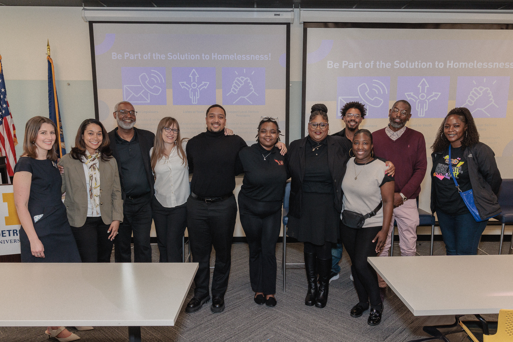 A group gathers at a screening for a mini-documentary on youth homelessness in Detroit produced by Poverty Solutions and the Detroit Phoenix Center