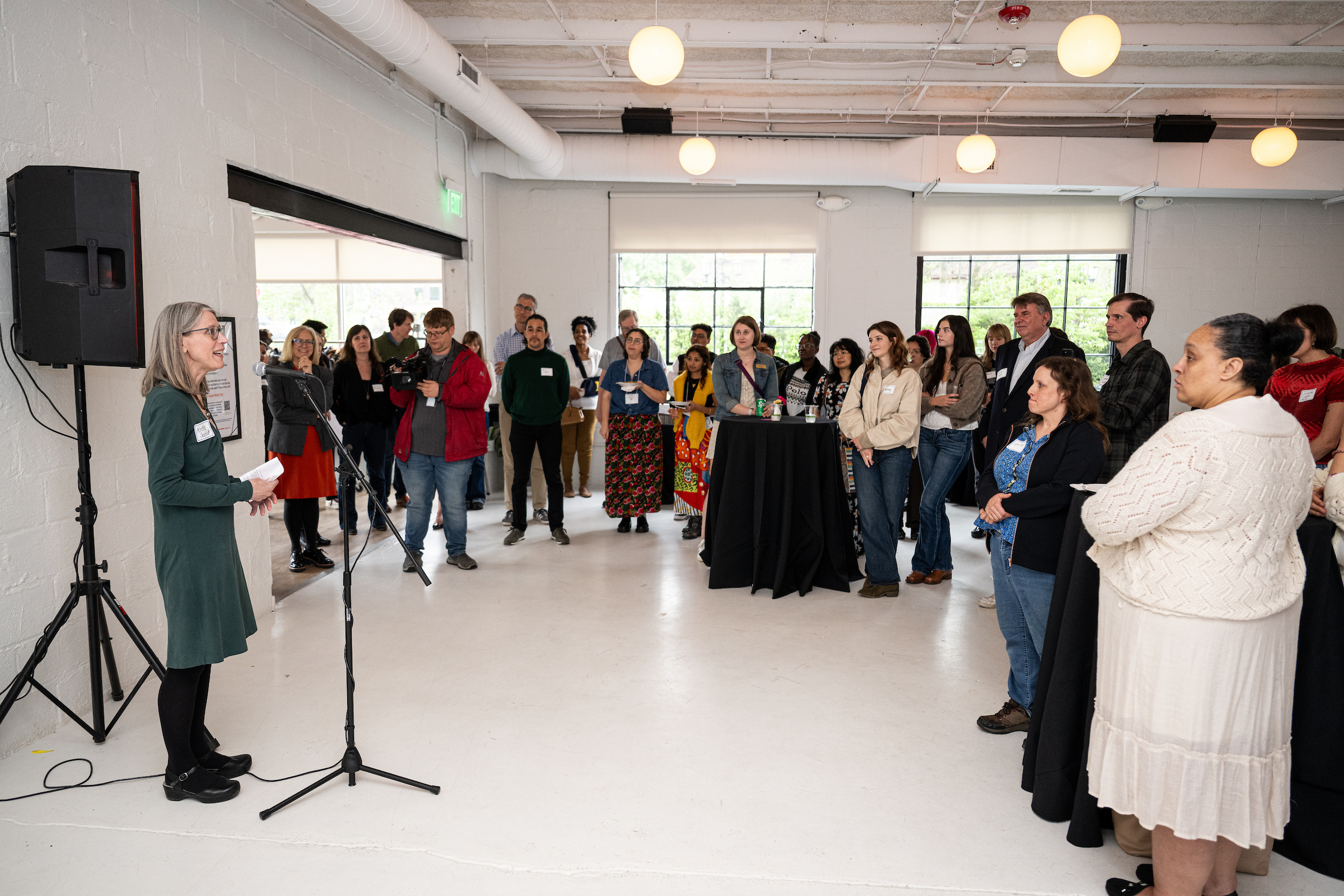 Poverty Solutions Director Kristin Seefeldt speaks at a celebration for the Guaranteed Income to Grow Ann Arbor (GIG A2) pilot program and the opening of the No Strings art exhibit at YORK on April 29, 2026. (Michigan Photography)